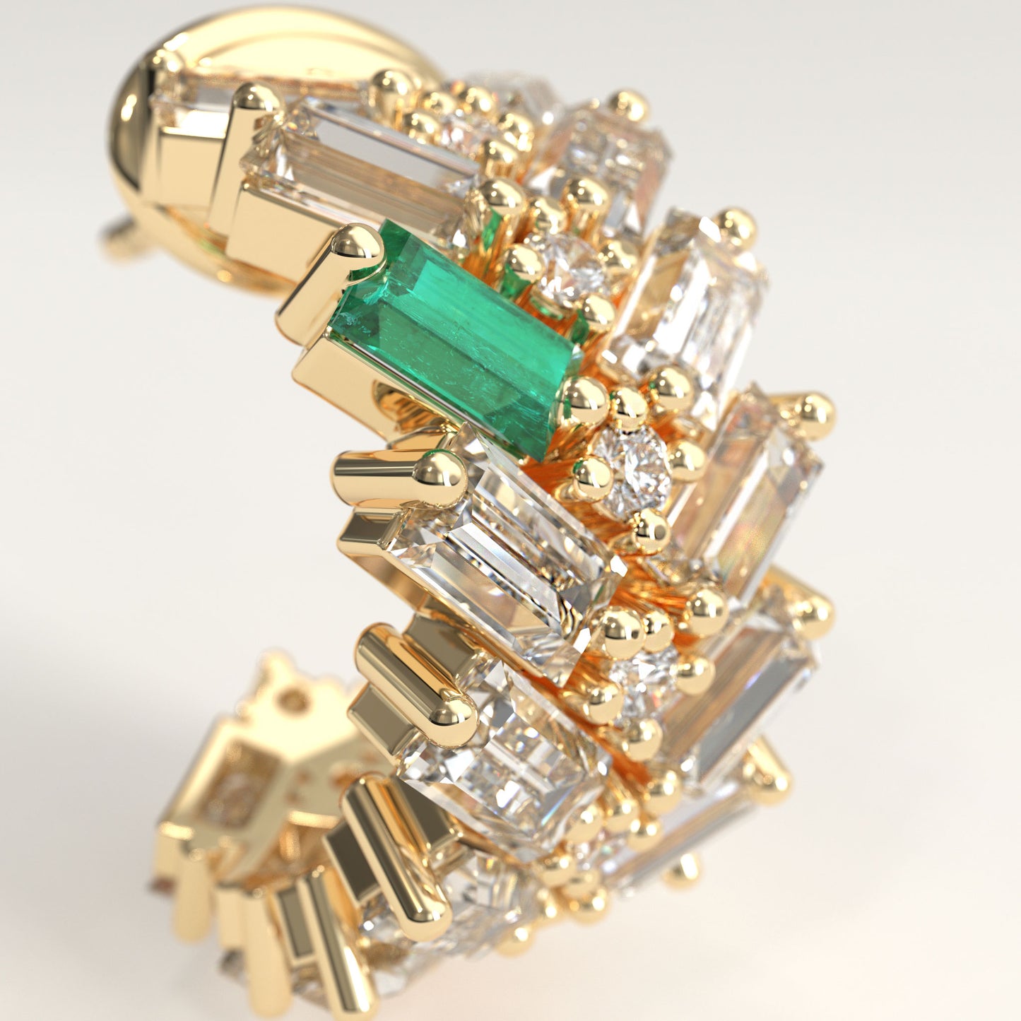Earn Grain Earrings in 18k yellow gold — Colombian emerald and baguette diamond herringbone hoop earrings, 1Em Collection by GOHI close up