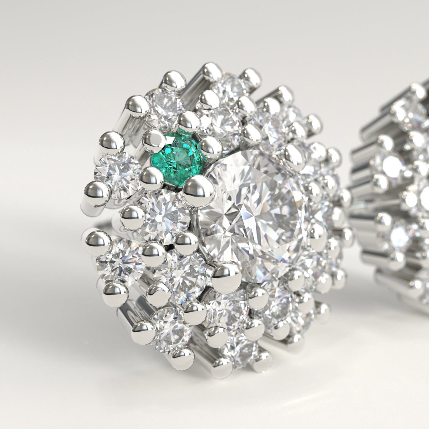 Stratum Earrings in 18k white gold — Colombian emerald and double halo round diamond cluster stud earrings, 1Em Collection by GOHI zoom