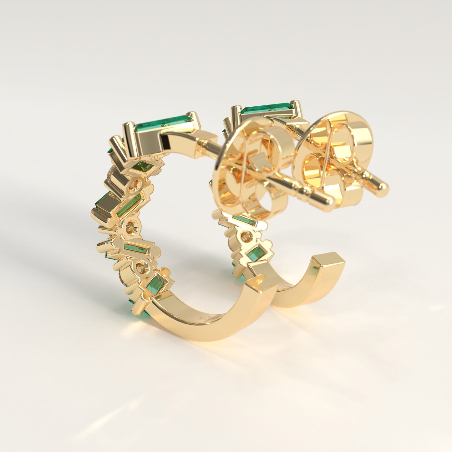 Shift Earrings in 18k yellow gold — Colombian emerald baguettes and round diamonds in alternating hoop earrings, Fault Line Collection by GOHI back
