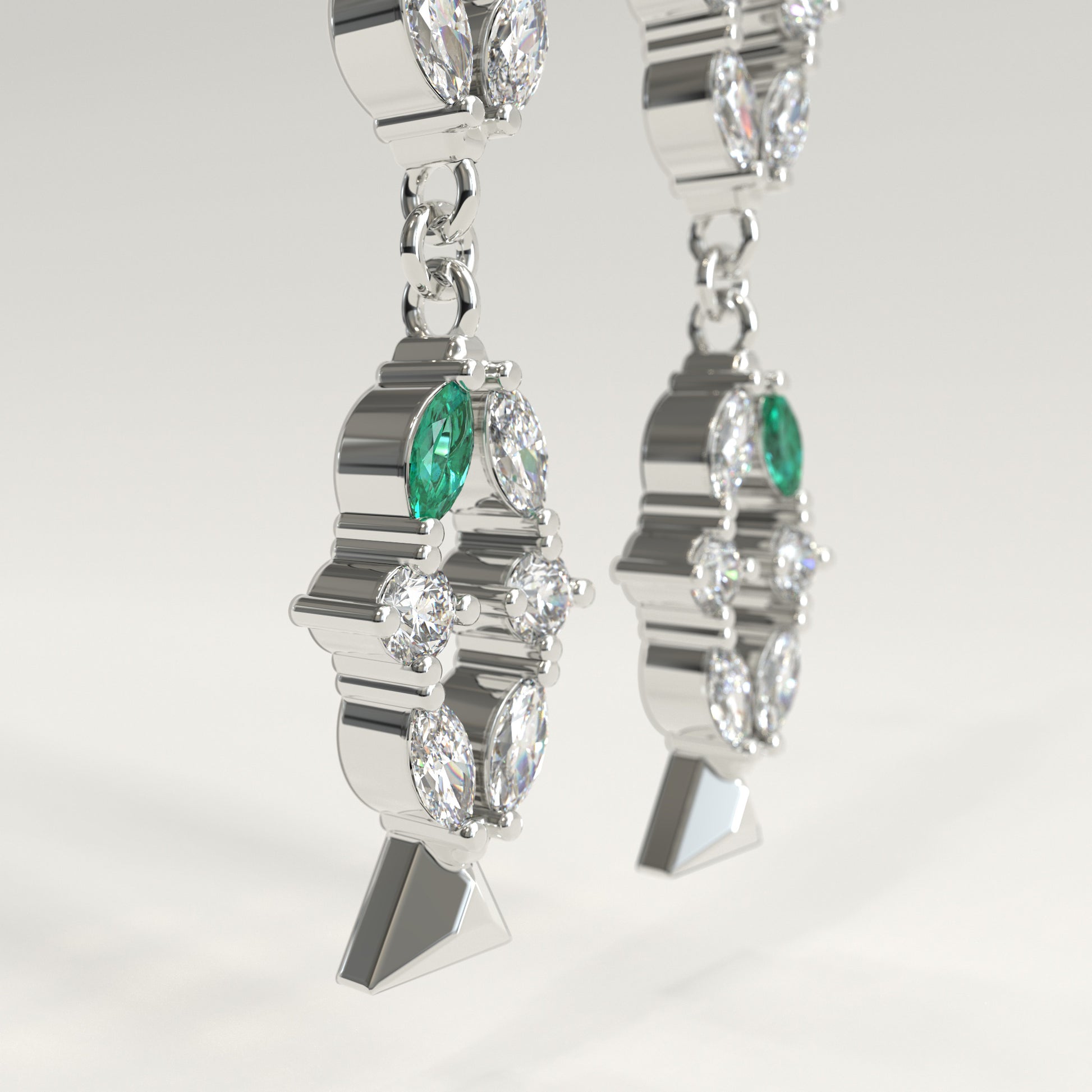 Flourish Earrings in 18k white gold — Colombian emerald and marquise diamond long drop earrings, 1Em Collection by GOHI close up