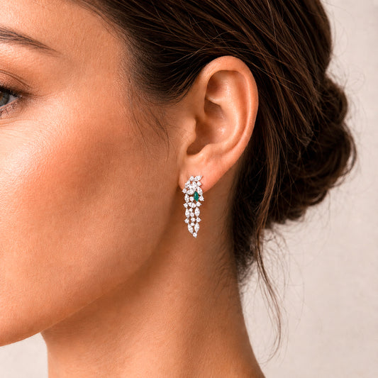 Garland Earrings in 18k white gold — Colombian emerald and marquise diamond chandelier earrings, 1Em Collection by GOHI on it