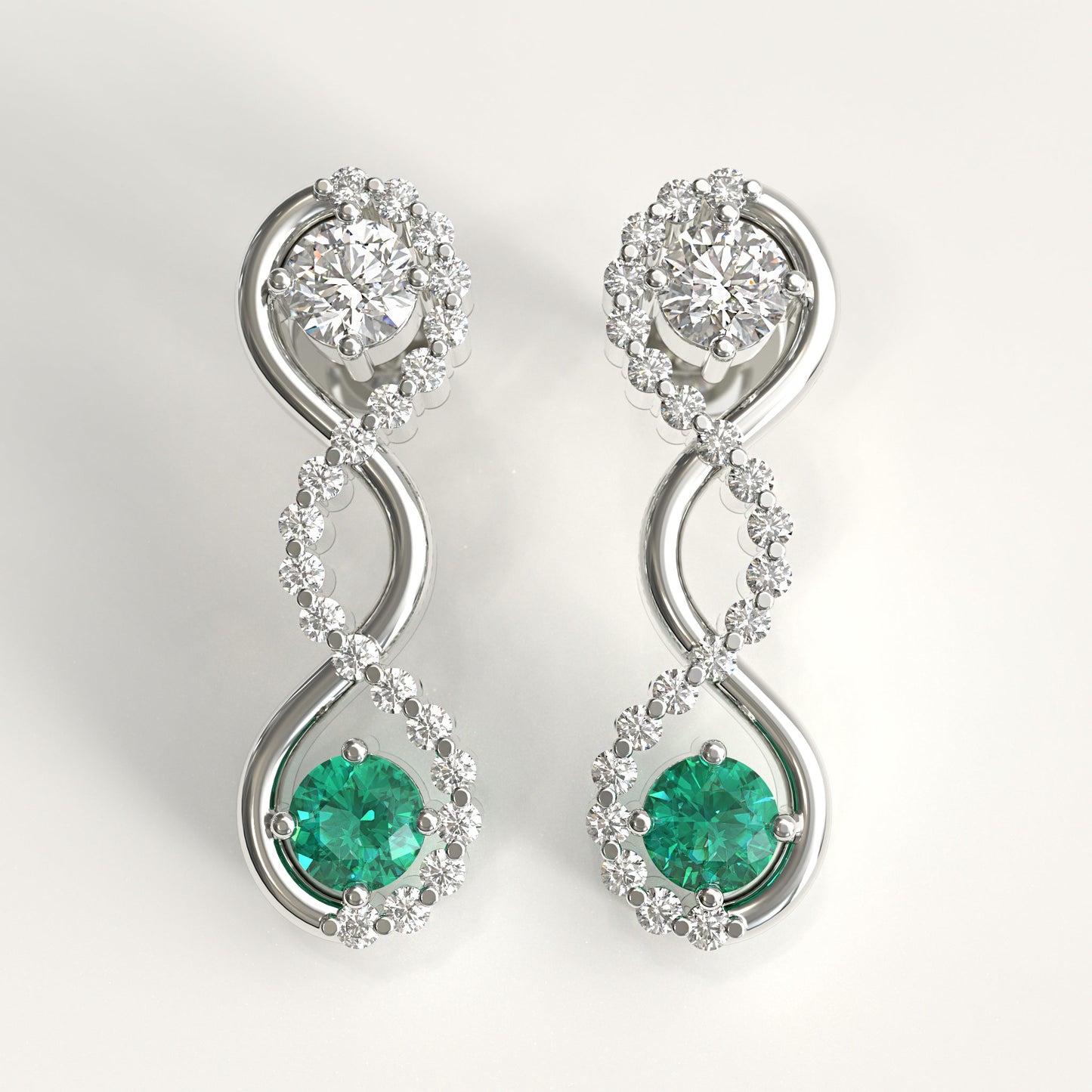Interlude Earrings in 18k white gold — Colombian emerald and round diamond twisted drop earrings, 1Em Collection by GOHI