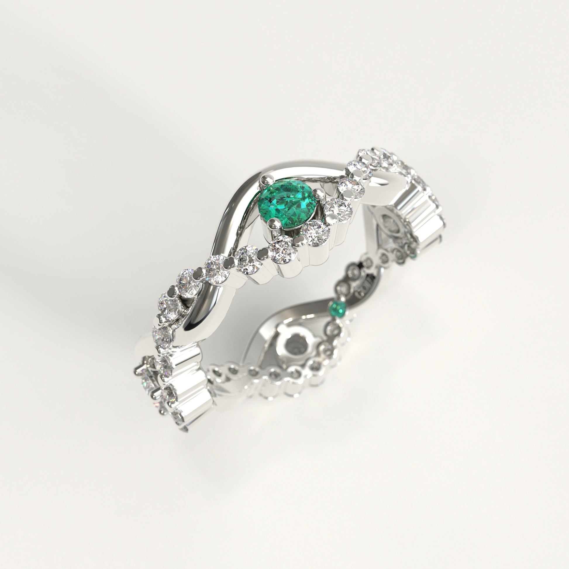Interlude Ring in 18k white gold — Colombian emerald and twisted diamond band, 1Em Collection by GOHI stand