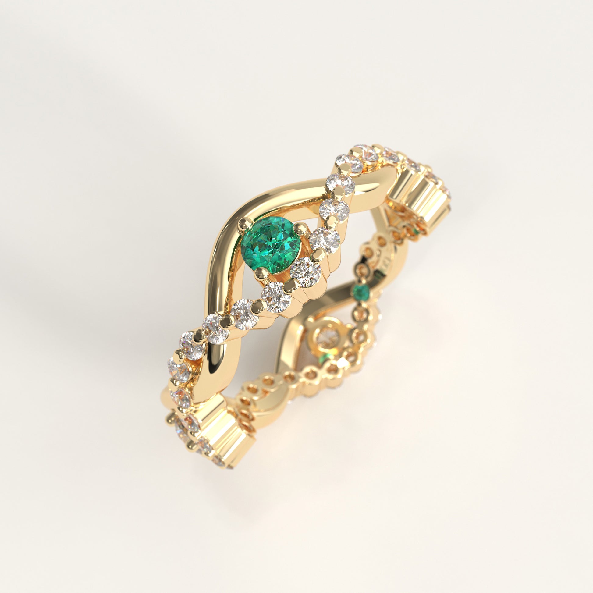 Interlude Ring in 18k yellow gold — Colombian emerald and twisted diamond band, 1Em Collection by GOHI stand