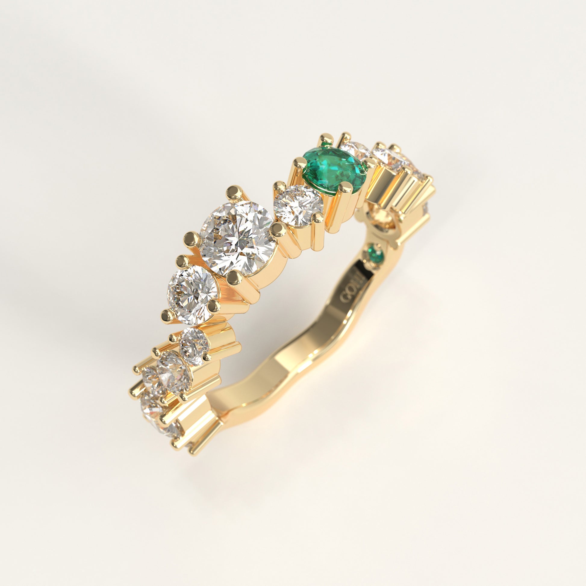 Meridian Ring in 18k yellow gold — Colombian emerald and graduated round diamond band, 1Em Collection by GOHI stand