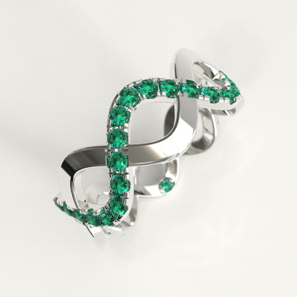 Close-up of interlocking bands with round Colombian emeralds, Weave Ring by GOHI Endless Collection