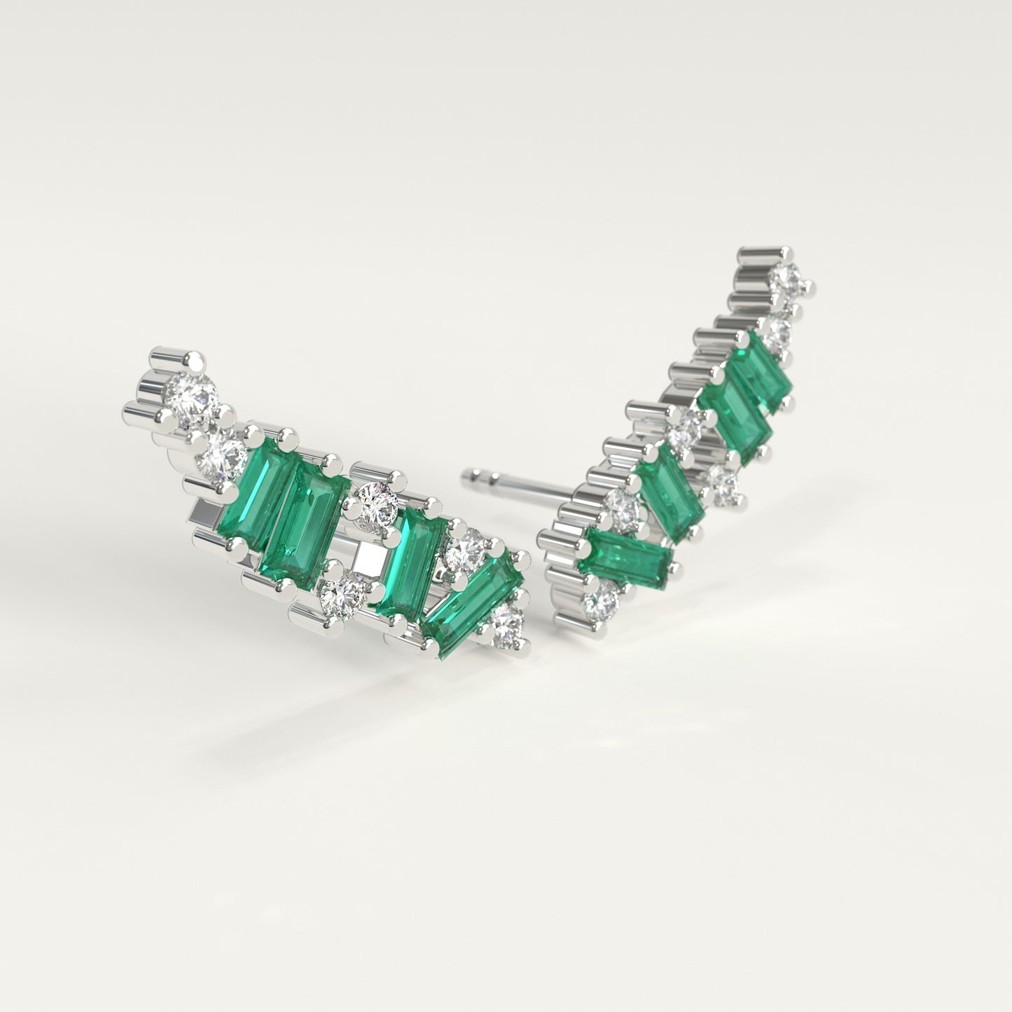 Rise Earrings in 18k white gold — Colombian emerald baguettes and round diamonds climbing the ear, Fault Line Collection by GOHI