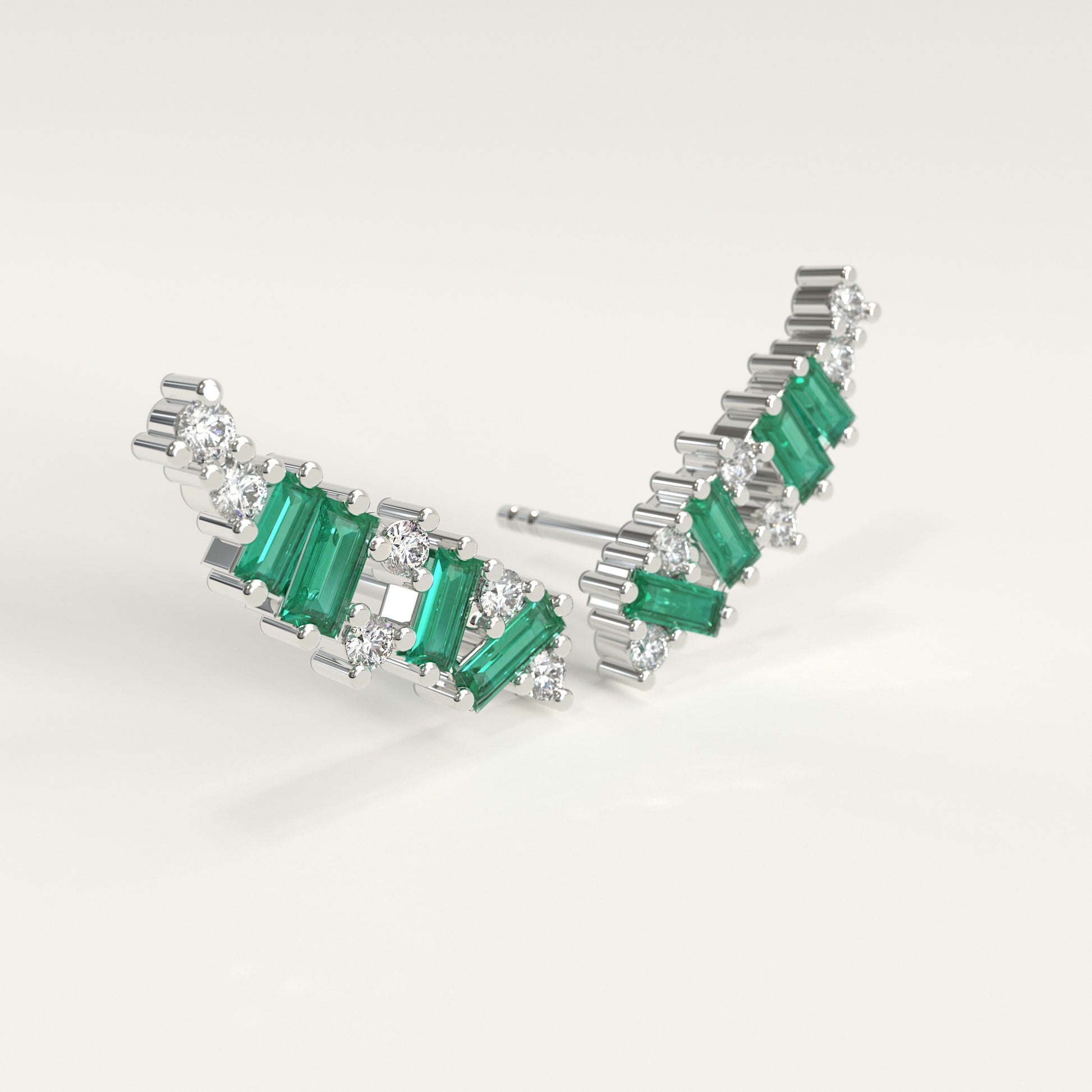 Rise Earrings in 18k white gold — Colombian emerald baguettes and round diamonds climbing the ear, Fault Line Collection by GOHI