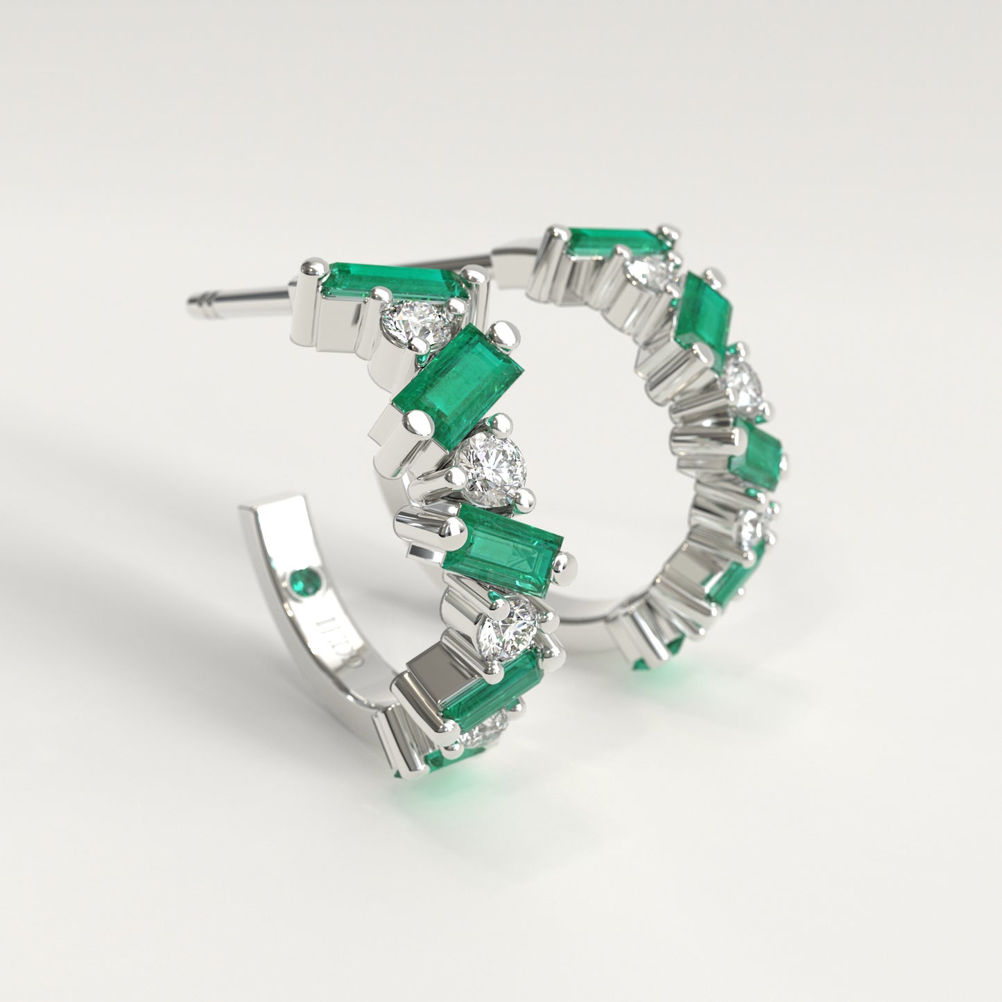 Shift Earrings in 18k white gold — Colombian emerald baguettes and round diamonds in alternating hoop earrings, Fault Line Collection by GOHI LATeral